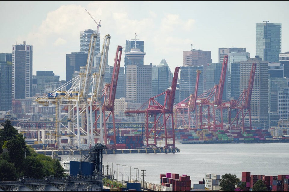 Gantry cranes sit idle above stacks of cargo containers at port in 91ԭ on Wednesday during a strike by International Longshore and Warehouse Union Canada workers in B.C. DARRYL DYCK, THE CANADIAN PRESS 