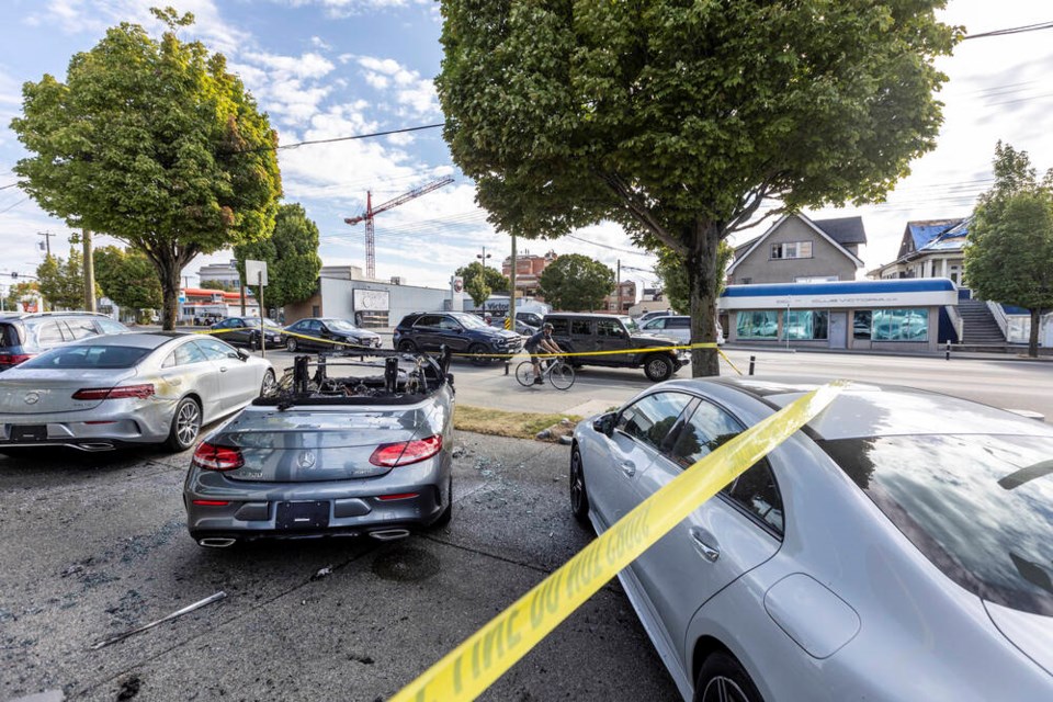 A new Mercedes convertible was torched overnight Tuesday at the Three Point Motors dealership on Government Street. DARREN STONE, TIMES COLONIST 