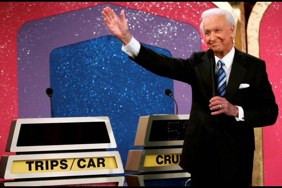FILE - Legendary game show host Bob Barker, 83, waves goodbye as he tapes his final episode of "The Price Is Right," in Los Angeles on Wednesday, June 6, 2007. Barker signed off from 35 years on the game show and 50 years in daytime TV in the same low-key, genial fashion that made him one of daytime TV's biggest stars. (AP Photo/Damian Dovarganes, File)