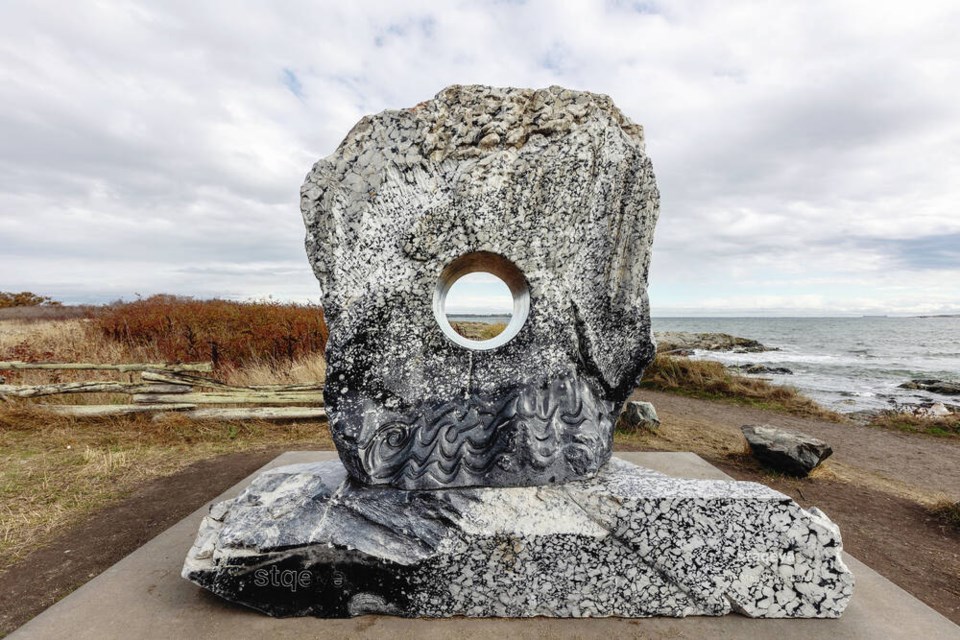 A sculpture in memory of a wolf that used to live on Chatham and Discovery islands was recently installed at Cattle Point. Kent Laforme created the marble sculpture, called The Soul of a Wolf, which has a circular opening that provides a view of the islands where the wolf lived before it was killed by a hunter in 2020. DARREN STONE, TIMES COLONIST 