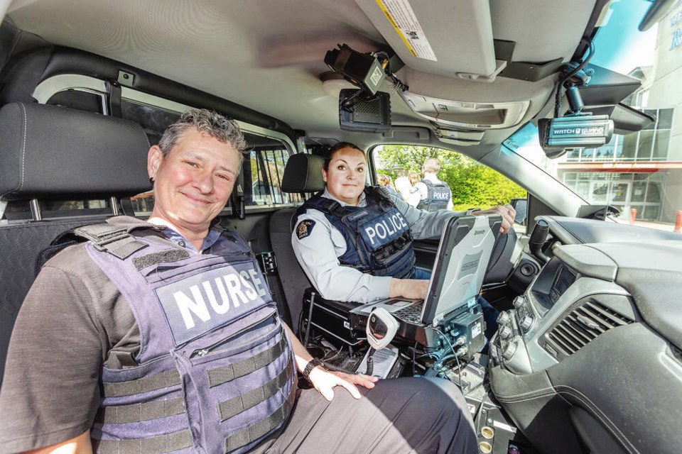 Nurse Shea MacKenzie, left, and Cpl. Lauren Ferguson of the West Shore RCMP Mental Health Unit. DARREN STONE, TIMES COLONIST 