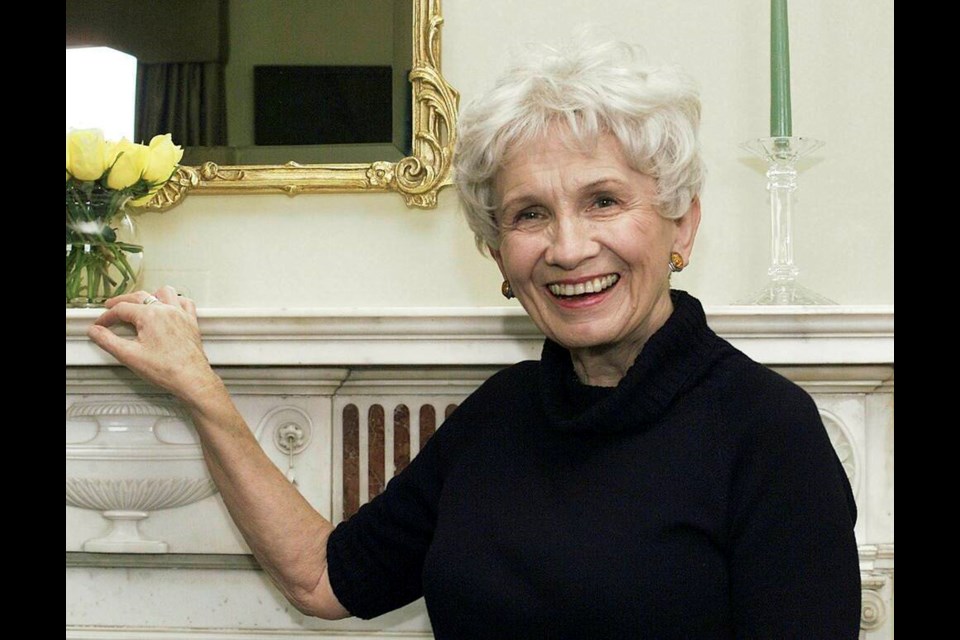 Author Alice Munro poses for a photograph at the Canadian Consulate’s residence in New York on Oct. 28, 2002. Munro, the Canadian literary giant who became one of the world’s most esteemed contemporary authors and one of history’s most honored short story writers, has died at age 92. | AP Photo / Paul Hawthorne