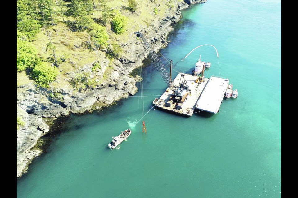 A drone view of the operation to raise the sunken fishing vessel Chief Joseph off Henry Island, Washington. U.S. COAST GUARD 