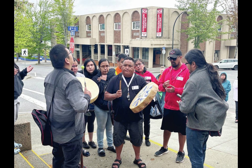 Dontay Lucas’s father, Patrick Lucas, left, joins drumming outside Port Alberni courthouse on Thursday. TIMES COLONIST 