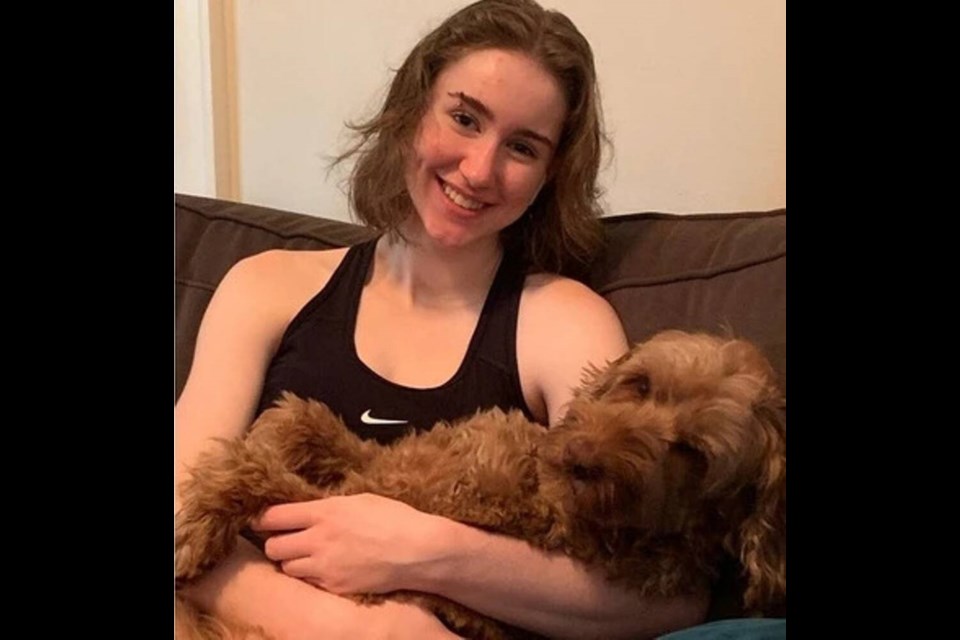 Sidney McIntyre-Starko with her beloved dog Lucy. VIA FAMILY 