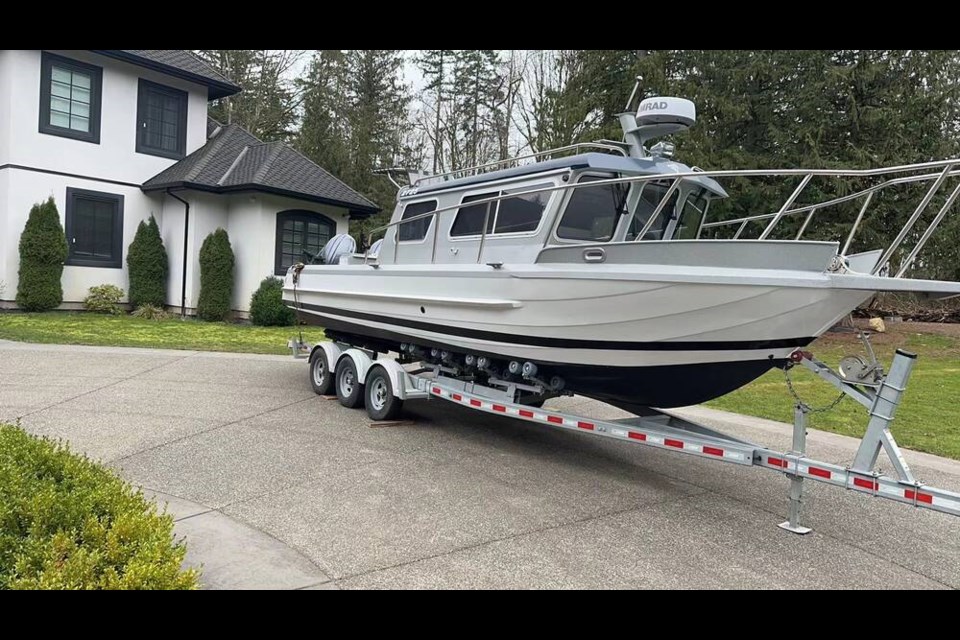 The boat is a grey, 2022 Kingfisher 2725 Weekender with twin Yamaha 150 horsepower outboard motors. VIA QUADRA ISLAND RCMP 