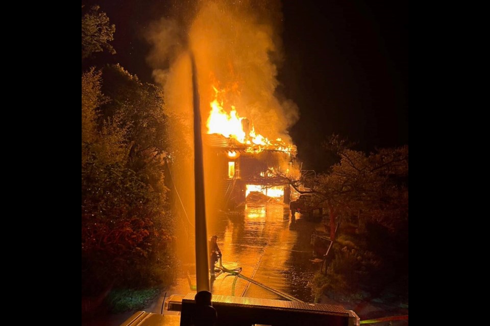 Firefighters respond to a house fire on Highview Terrace in North Saanich on June 9, 2024. VIA NORTH SAANICH VOLUNTEER FIREFIGHTERS ASSOCIATION