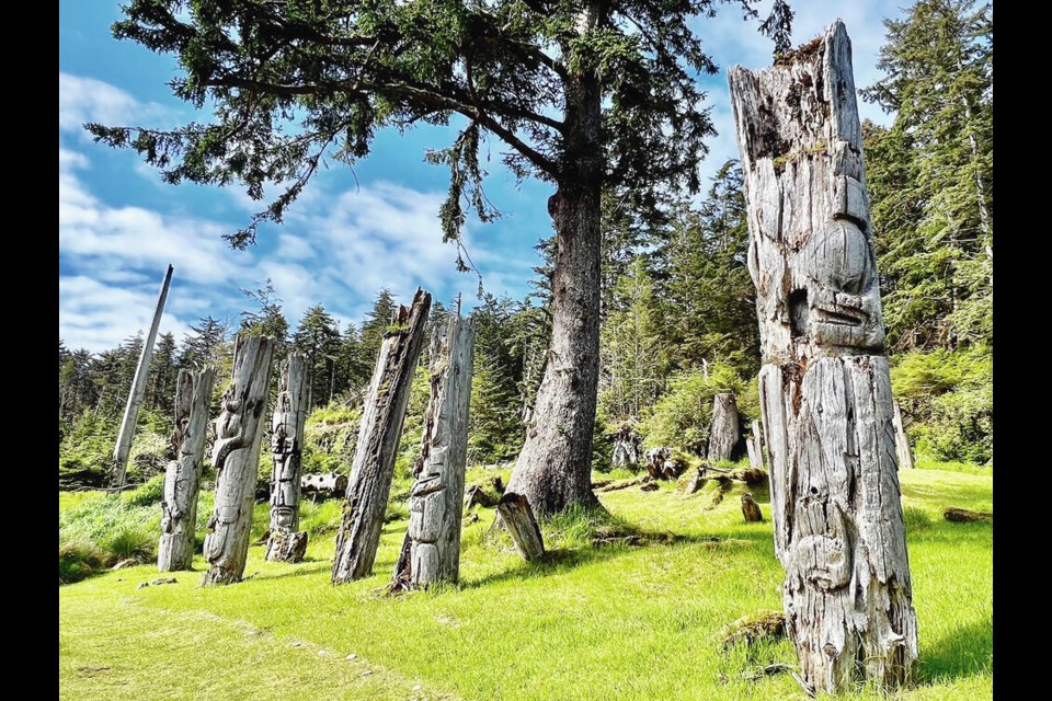 Mortuary poles, that once held the remains of chiefs from the Kunghit Haida, can still be seen at the ancient Haida village site of SGang Gwaay (formerly Ninstints). They are being allowed to slowly return to the earth on this UNESCO World Heritage Site and National Historic Site. KIM PEMBERTON  