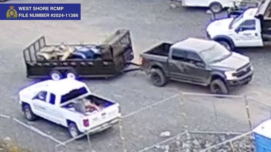 Surveillance image shows a truck towing a trailer with two ATVs. WEST SHORE RCMP 