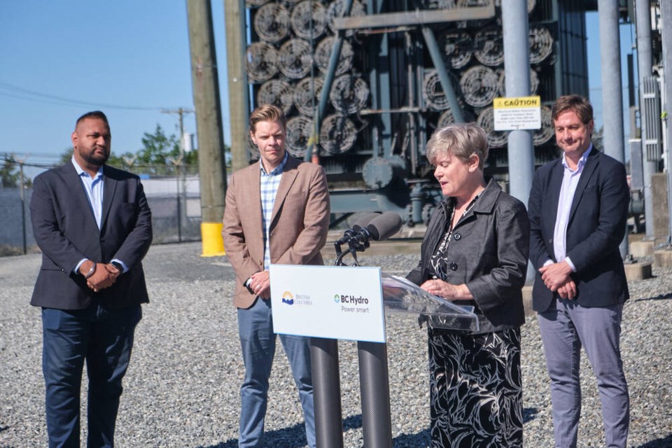 From left, Juan de Fuca MLA Ravi Parmar, Saanich Mayor Dean Murdock, Energy Minister Josie Osborne and Transportation Minister Rob Fleming at the announcement at Horsey power substation on Topaz Avenue in Victoria on Friday. TIMES COLONIST 