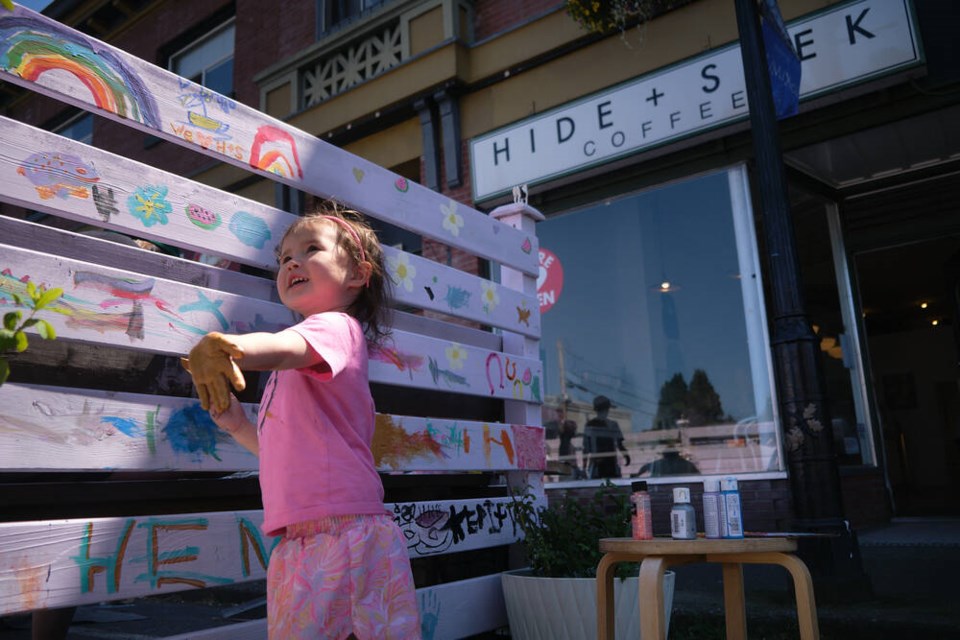 Avalon Clarke, 3, shows off her work at the community patio paint-in at Hide+Seek Coffee on Oak Bay Avenue on Sunday, July 14. TIMES COLONIST 