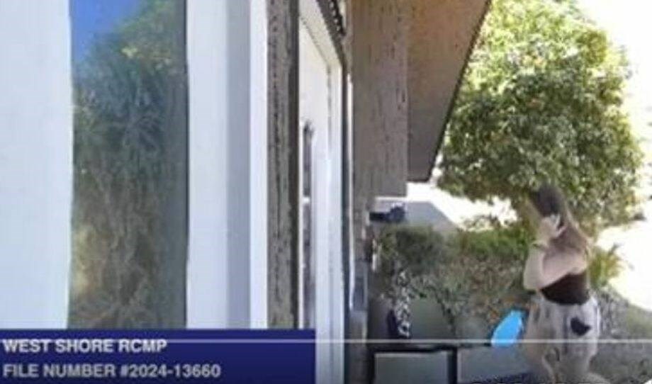 Image from a home surveillance system in Langford shows a woman approaching the bracelet display. WEST SHORE RCMP VIA X 