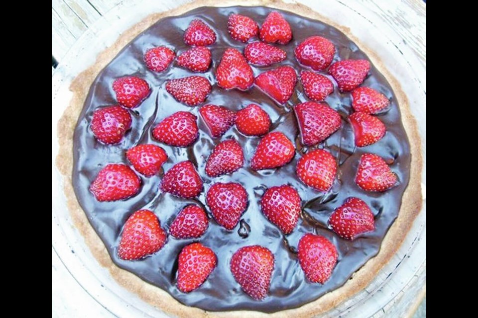 This strawberry chocolate cheesecake looks imposing, but is actually easy to make. HELEN CHESNUT 