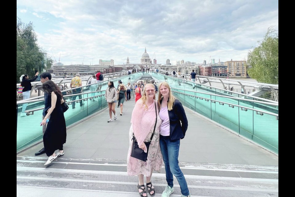 The author and her daughter Hannah pose on London’s Millennium Bridge, in the Bankside neighbourhood, with St. Paul’s Cathedral in the background. The foot bridge allows walkers to pass over the River Thames easily. KIM PEMBERTON 