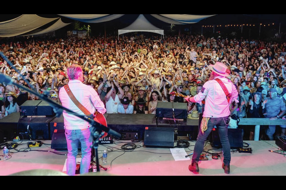 Thousands of country music fans took in a set by Washboard Union on Thursday as the Vancouver band headlined the opening day of Sunfest at Lake Cowichan. The festival continues through the weekend. ROB PORTER, RMS MEDIA 