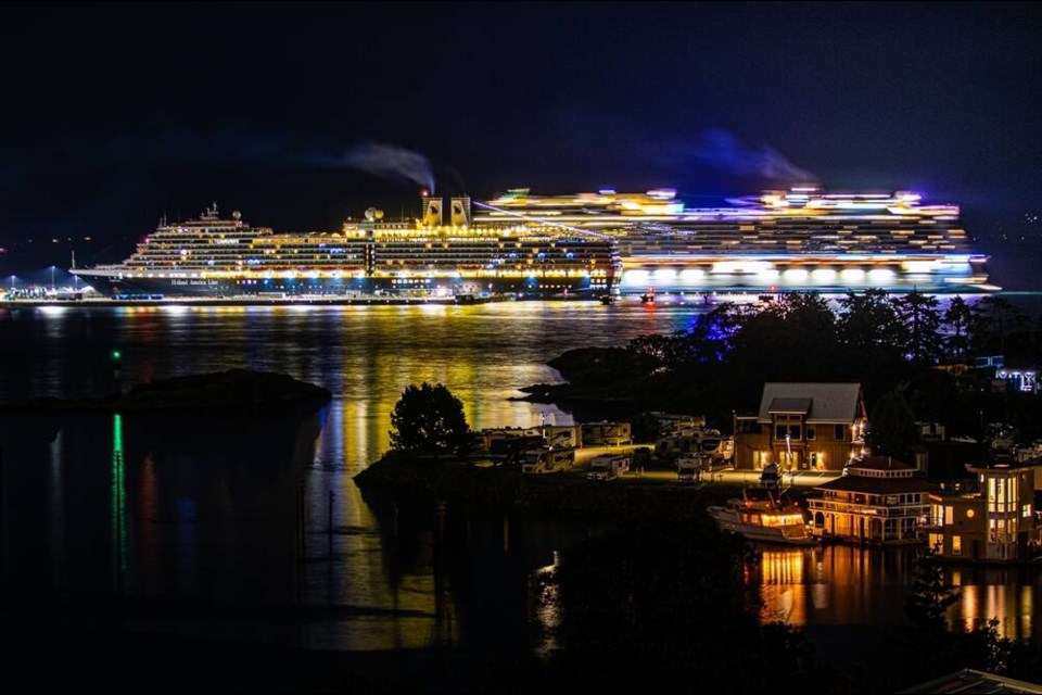 12:01 a.m. - Cruise ship Eurodam in front of departing Norwegian Bliss at Ogden Point by Peter Reid.