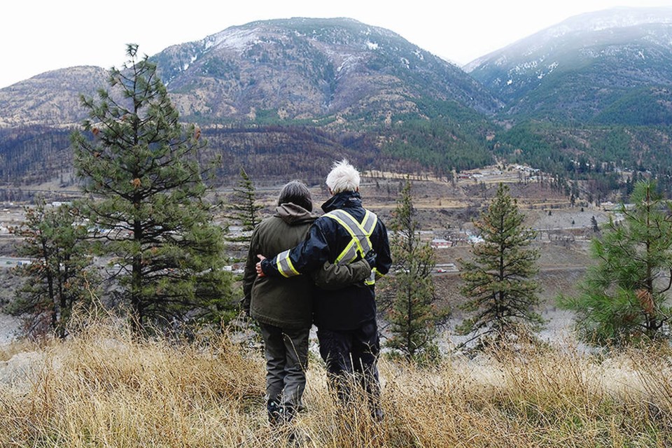 Lytton residents Patsy Gessey and Owen Collings survey the townsite, which was devastated by the 2021 Lytton Creek fire. Gessey’s story, co-created by Climate Disaster Project co-founder Francesca Fionda, is one of about 30 featured in Eyes of the Beast. JEN OSBORNE, CLIMATE DISASTER PROJECT 