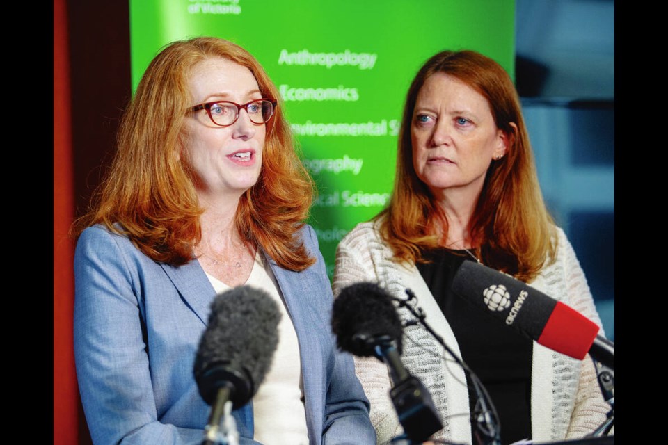 UVic researchers Erica Woodin, left, and Catherine Costigan speak about their findings at a news conference at Victoria Police Headquarters on Tuesday. DARREN STONE, TIMES COLONIST 