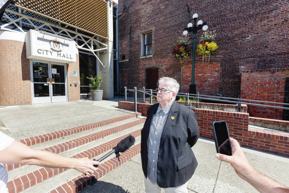 Victoria Mayor Marrianne Alto talks to media about her idea of turning portions of large parking lots into temporary overnight sheltering areas. DARREN STONE, TIMES COLONIST 