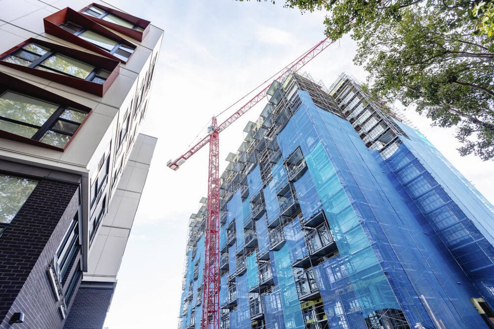 Tresah East, seen at left, and Tresah West on Speed Avenue. The 12-storey Tresah West project is still under construction and is slated to become rentals. DARREN STONE, TIMES COLONIST  