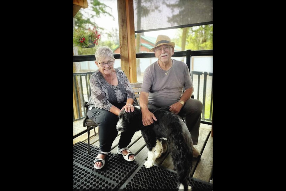 Kim and Mel Breland of Campbell River with Sadie, their late son’s dog. VIA LAURIE CLARK 