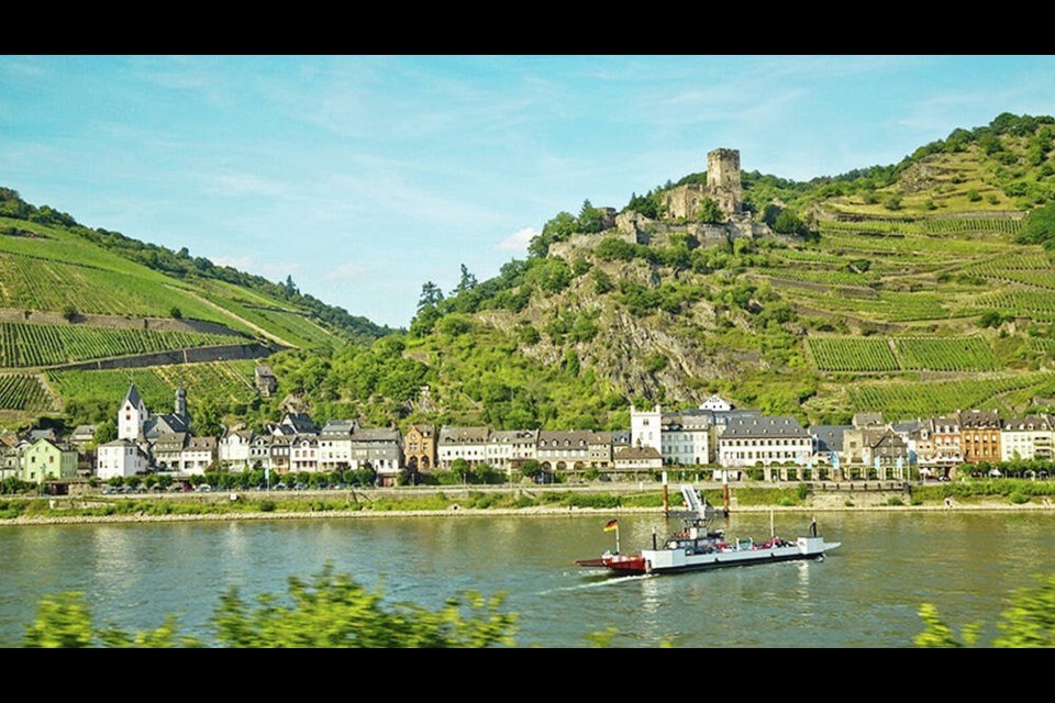 A Rhine ferry shuttles passengers to the town of Kaub, in the shadow of Gutenfels Castle.	DOMINIC BONUCCELLI 