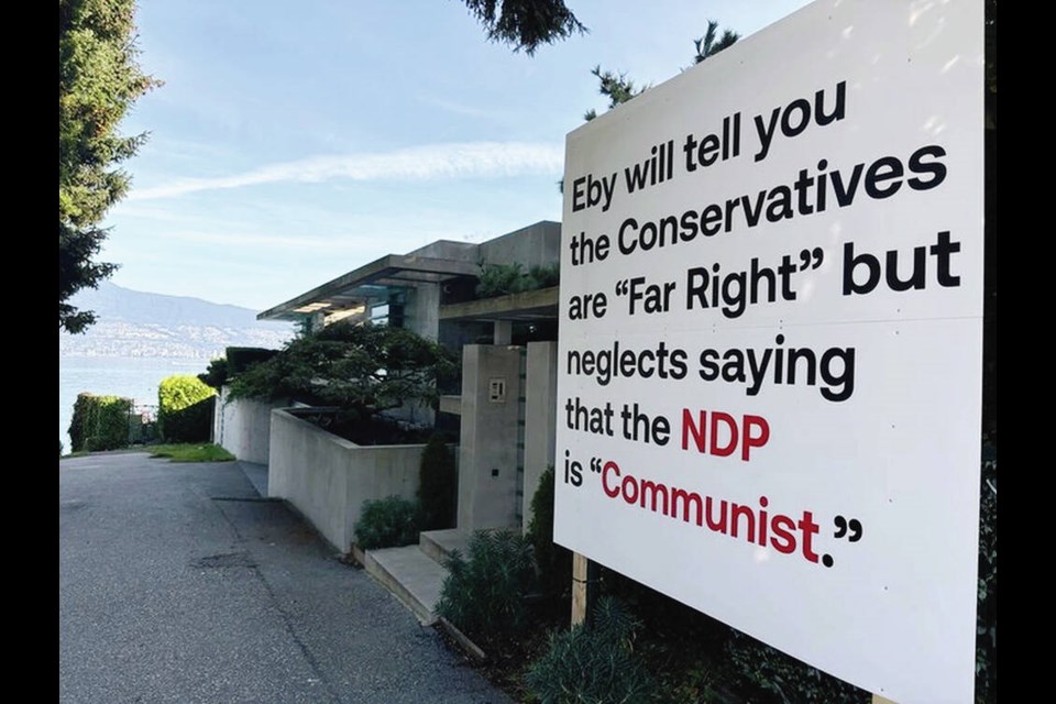 A sign outside Vancouver billionaire Chip Wilson’s home claims the B.C. NDP are Communists as voters prepare for the Oct. 19, 2024, provincial election. DAVID CARRIGG, VANCOUVER SUN 