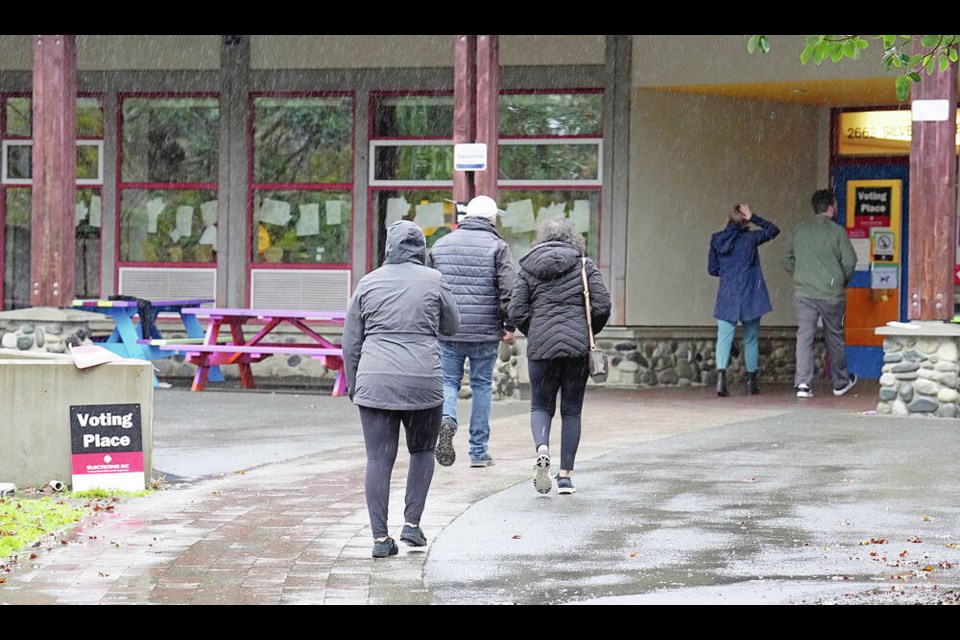 Voters head into Crystal View Elementary school on Silverstone Way in Langford on Saturday. ADRIAN LAM, TIMES COLONIST 