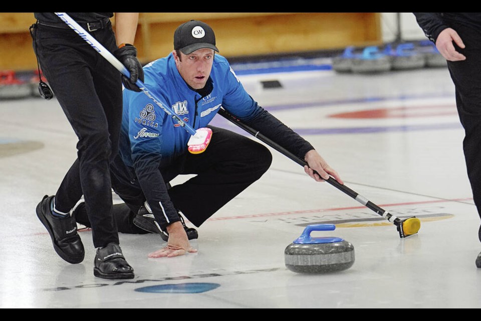 Skip Jason Montgomery throws his rock in a match against Team DeJong during the men’s final of World Curling Tour’s Island Shootout, at the Victoria Curling Club, on Monday, Nov. 11, 2024. ADRIAN LAM, TIMES COLONIST 