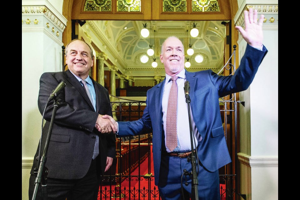 Then Green Party leader Andrew Weaver and NDP leader John Horgan at the B.C. legislature in 2017. They had traded barbs on occasion but a strategic alliance turned into a genuine friendship, writes Les Leyne. DARREN STONE, TIMES COLONIST 