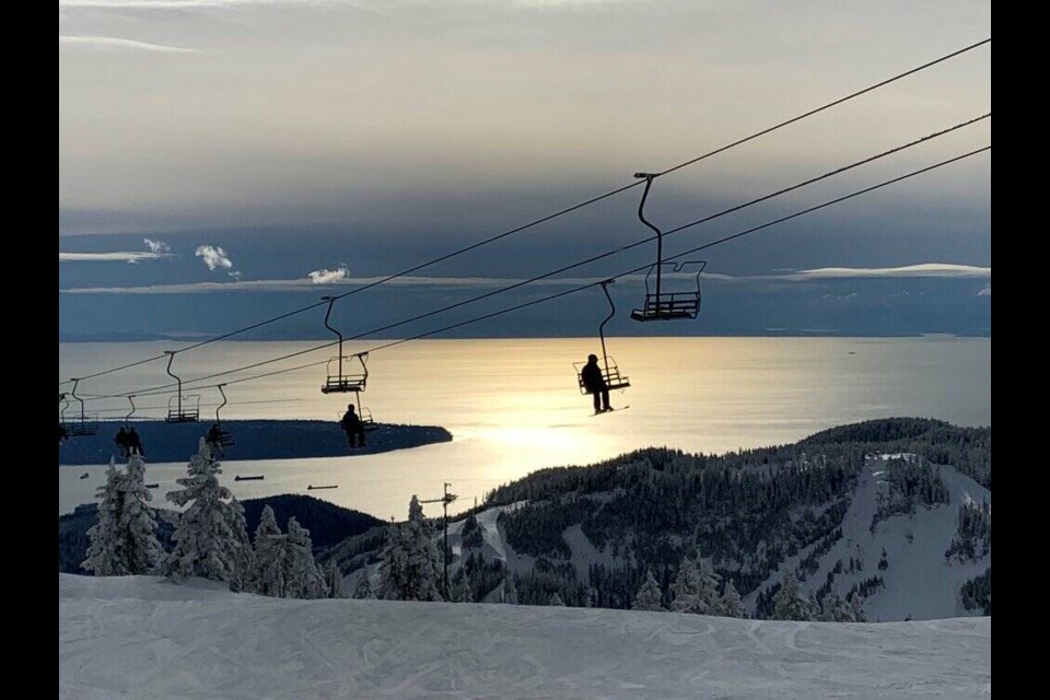 Skiers and snowboarders ride to the peak of Mount Strachan at Cypress Mountain Ski Resort, one of three Vancouver ski hills at risk of diminished snowfall in the coming decades, according to experts. STEFAN LABBÉ, GLACIER MEDIA 