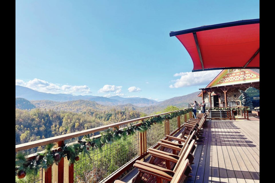 Visitors on a sunny day in fall enjoy a clear view of the Great Smoky Mountains from an upper observation deck at Anakeesta Mountaintop Adventure Park. PHOTOS BY KIM PEMBERTON 