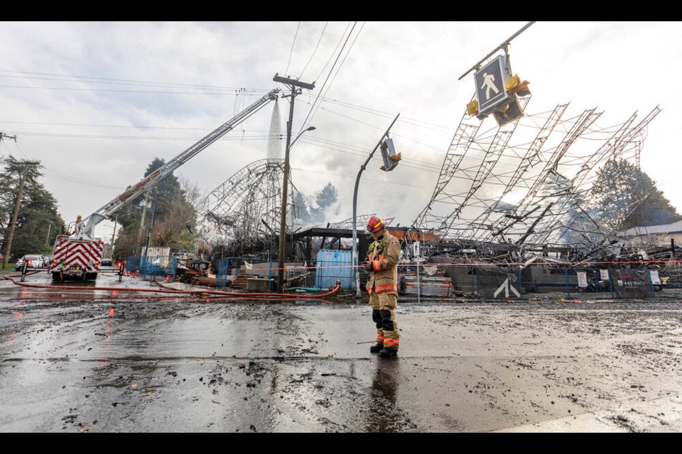 A massive fire during a windstorm destroyed a partially built condo building on Quadra Street in Saanich on Nov. 20. Wind-whipped flames, reaching far into the sky, could be seen from as far away as Bear Mountain in Langford and even in Port Angeles, Washington. DARREN STONE, TIMES COLONIST 