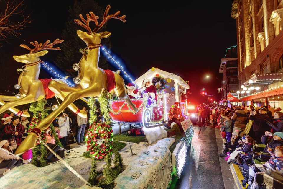 Santa’s sleigh makes its way along Humboldt Street during the 42nd Peninsula Co-op Santa Claus Parade in downtown Victoria on Saturday night.    DARREN STONE, TIMES COLONIST