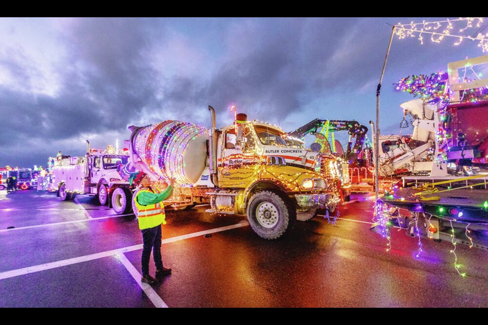 Trucks light up and line up with a little help at the start the IEOA Truck Parade and Food Drive at Ogden Point, Saturday evening. DARREN STONE, TIMES COLONIST  