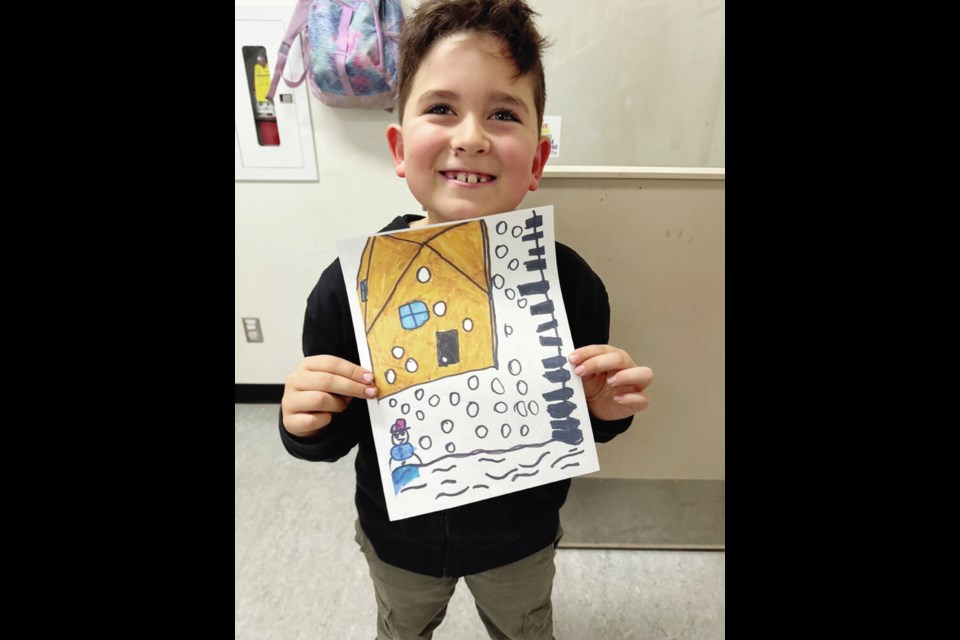 Grade 2 student Weston Taiji with his winning card design. VIA DISTRICT OF SAANICH 