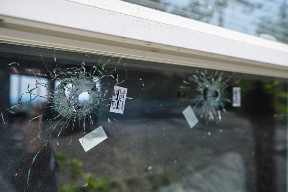 Bullet holes in the window of a home owned by Punjabi music star AP Dhillon in Colwood, on Sept. 2, 2024. TIMES COLONIST 