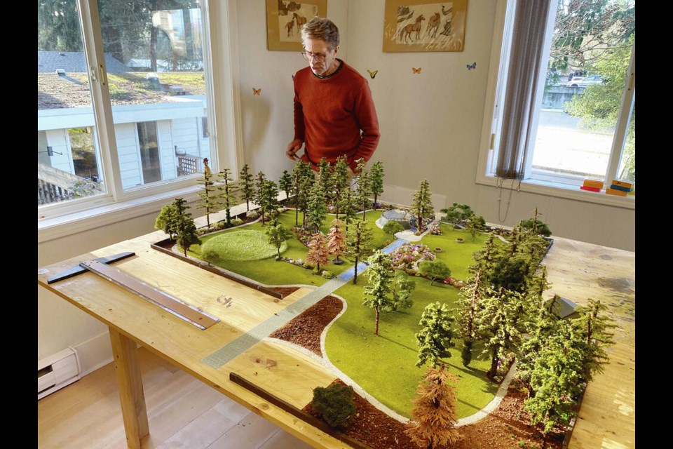 Woodlands Park owner Ralph Stoerzer, who grew up on the property, with his model for the planned park. He says turning the property into a city park in Langford’s core  and not another high-rise development  was the outcome he preferred and one his parents would have wanted.	 TIMES COLONIST 