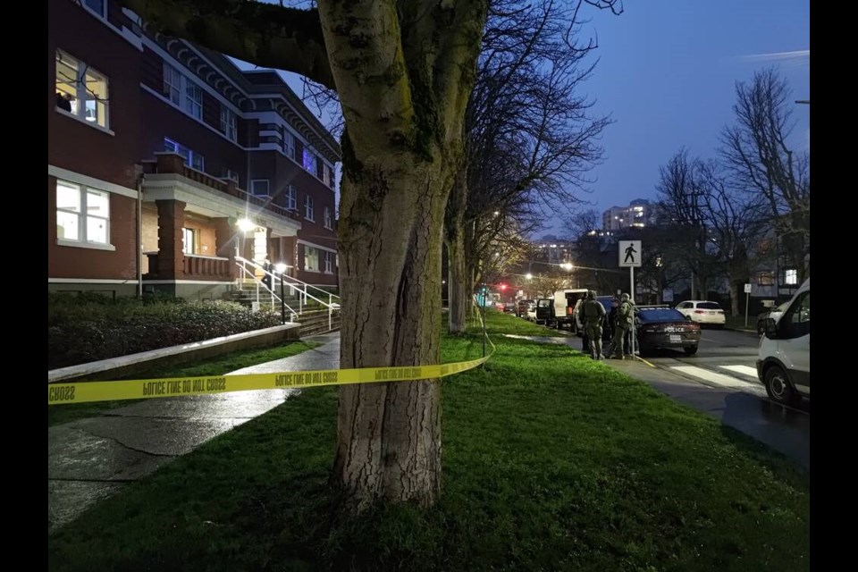 Officers with the Greater Victoria Emergency Response Team stand outside Mount Edwards Court on Jan. 5, 2025. TIMES COLONIST 