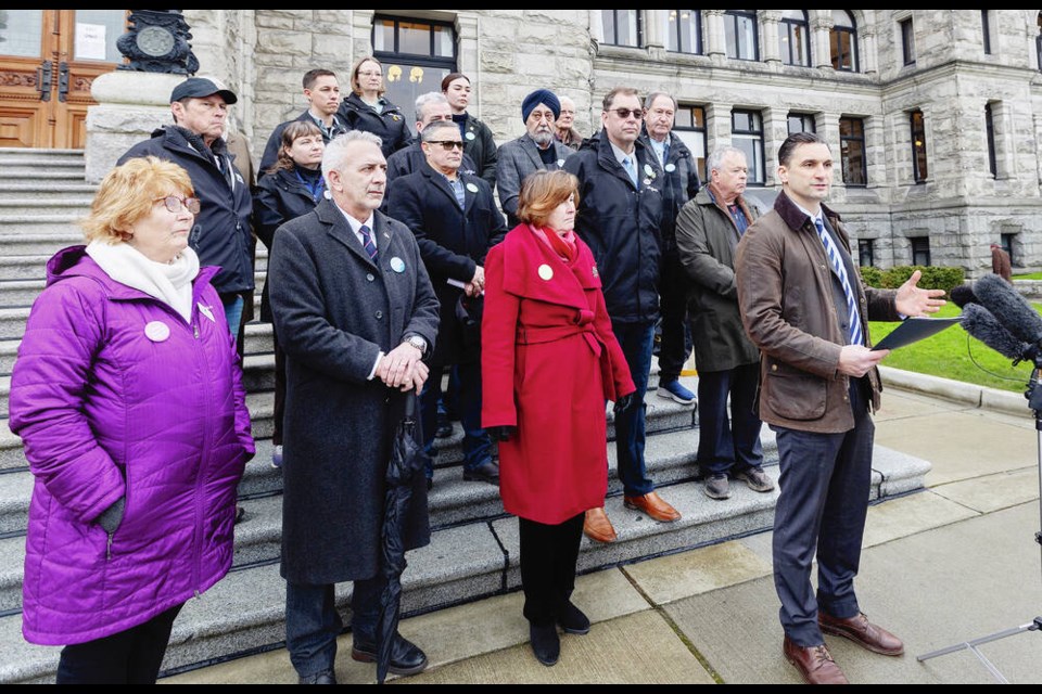 North Cowichan Mayor Rob Douglas and representatives of nine other south Island municipalities in front of the B.C. legislature on Thursday. DARREN STONE, TIMES COLONIST 