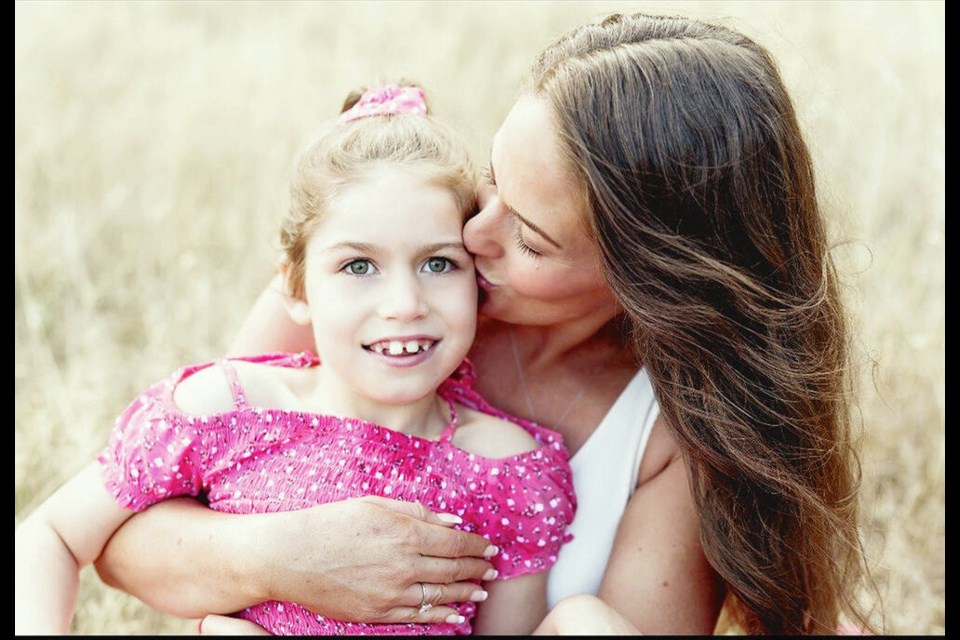 Jori Fales with daughter Charleigh Pollock, 9. Charleigh, who attends Happy Valley School, has a rare, progressive, and fatal neurodegenerative disorder known as Batten disease, and receives bi-weekly enzyme-replacement infusions. VIA JORI FALES 