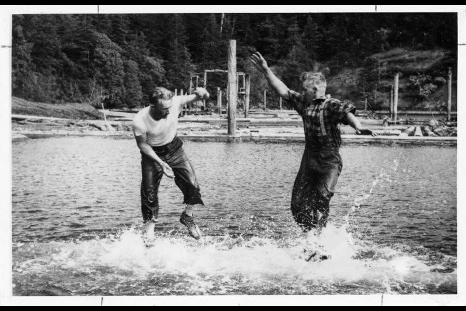 Ardiel and Jubiel Wickheim show their birling skills at Cooper’s Cove near Sooke in the early 1950s. SOOKE REGIONAL MUSEUM 