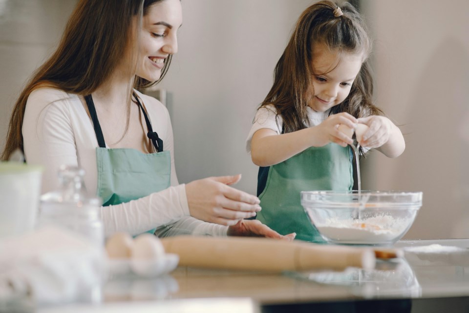 mom-and-daughter-cooking