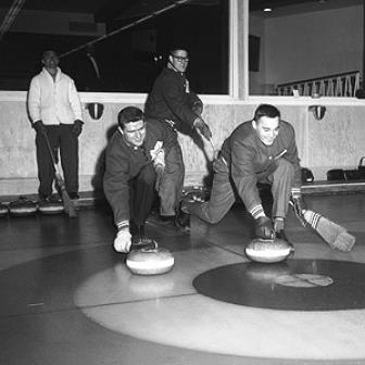 Allan Stanley curling with Frank Mahovlich and Tim Horton.